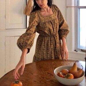 Christy Dawn Finley in golden blooming vine